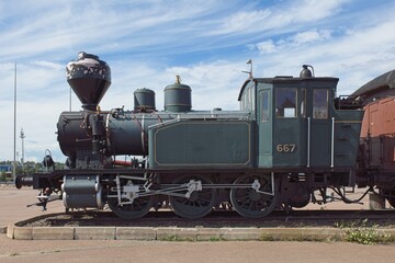 Naklejka premium Side view of an old steam locomotive.