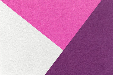 Texture of craft white, purple and violet shade color paper background, macro. Vintage abstract magenta cardboard