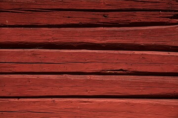 Fototapeta premium Weathered red painted traditional log wall.