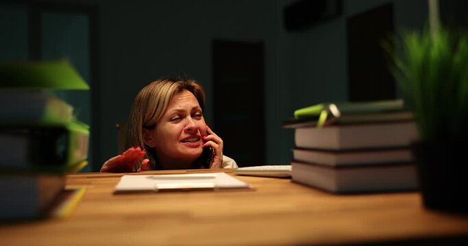Frightened shocked woman afraid of thunderstorm calls rescue service on phone and explaining situation