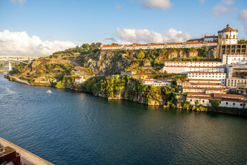 Obraz premium Douro River and terracota rooftops, UNESCO World Heritage Site at sunset. Porto, Portugal