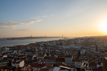 View of the 25 de Abril bridge, famous Lisbon tourist landmark.Tagus river. Portugal.