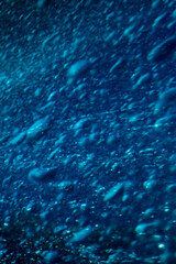 Fototapeta na wymiar Vertical texture of bubbles of water