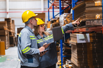 Factory manager, foreman worker checking stock inventory on good shelf in delivery storehouse of logistic storage warehouse, shipping distribution business, package box industry job for retail market - obrazy, fototapety, plakaty