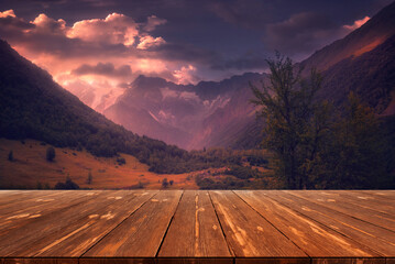 Beautiful mountain view with empty wooden table. Natural template landscape