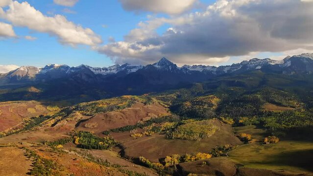 Colorful Colorado Million Dollar Highway Mount Sniffels Wilderness Dallas Range aerial cinematic drone sunny morning autumn fall colors San Juans Ridgway Ralph Lauren Ranch 14er forward slowly motion