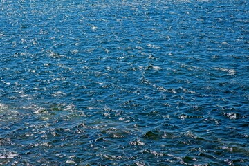View of waves on water surface background.