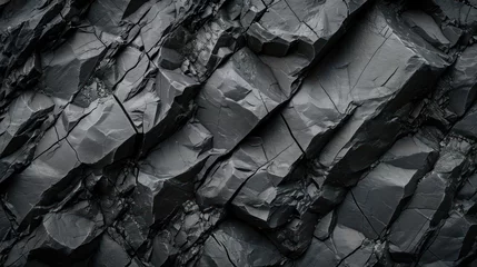 Deurstickers Textured black stone background created by a dark grey, rugged mountain surface with prominent cracks. Designers have plenty of space for creativity.  © Matthew