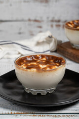 Rice pudding dessert. Delicious rice pudding on a white background. Close up