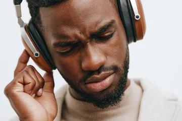 Deurstickers one man guy jacket background portrait fashion dj american music headphones african black © SHOTPRIME STUDIO