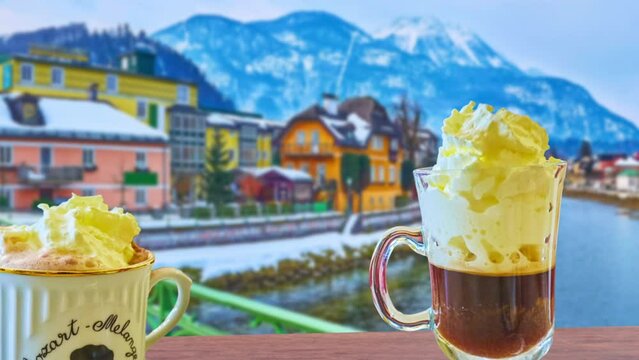 Parallax scrolling of coffee melange against the Alps in Bad Ischl, Austria