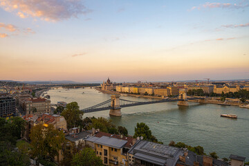 Fototapeta na wymiar September Sunset on the Danube river in Budapest from the citadel. view of the Elisabeth Bridge
