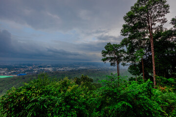 The natural background of the beautiful twilight sky, the surrounding atmosphere (trees, rivers, mountains) is a beautiful view of the journey, the view point.