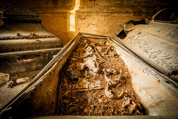 Thea abandoned rotten morgue with coffins.