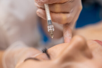 Mature woman receiving anti age teatment at beauty clinic