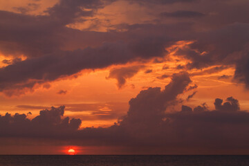 Red cloudy sky on a sunset, natural background