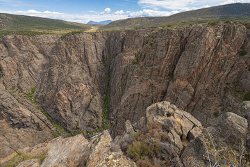 Deep and dark canyons in the north rim of the Black Canyon of the Gunnison at Devil's Lookout on the south rim