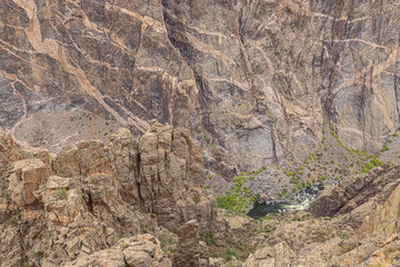 At the base of the Painted Wall seen from Cedar Point on the south rim of the Black Canyon of the...