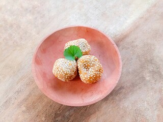 onde-onde filled with green beans. Traditional Indonesian snack, flour filled with peanuts then...