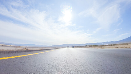 Fototapeta na wymiar Daytime Road Trip: Nevada to California on HWY 15