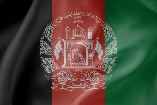 Afghanistan waving flag close up fabric texture background