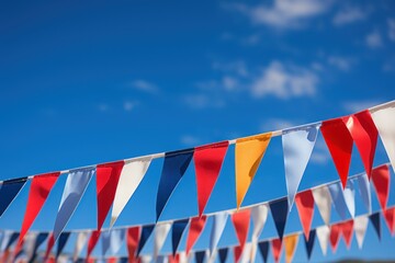 Close-up of pennant flags against blue sky, in the French National Colors, Sault, Provence, Vaucluse, - obrazy, fototapety, plakaty