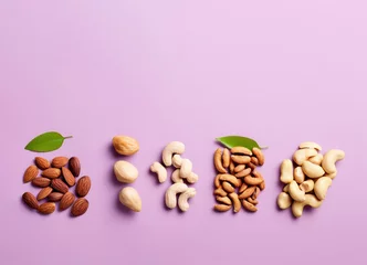 Fotobehang Top view of nut mix of peanuts, cashews, hazelnuts and almonds on a light purple background. Free space for product placement or advertising text. © OleksandrZastrozhnov