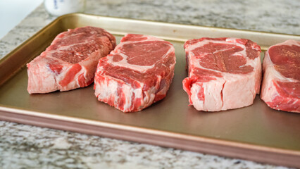 Young Man Enthusiastically Preparing Dinner in Modern Kitchen