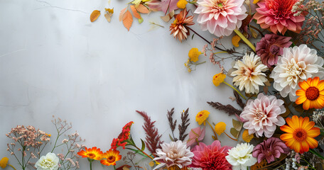 Autumn floral composition on a light backdrop, showcasing beautiful flowers. Floristic decoration creating a natural and enchanting floral background.