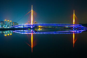 Masan Fish Market. Marine Nuri Park. Night view of the West Port Park Bridge in Changwon, South Gyeongsang Province, South Korea.