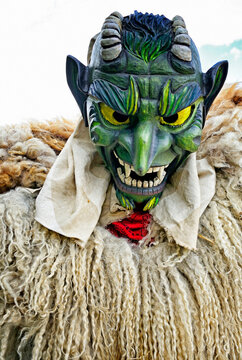 Nendaz, Valais, Wallis, Switzerland,  Europe - young man disguised as Tsch&auml;gg&auml;tt&auml; - Valasian frightening figure, Tschaeggaetae - traditional, regional mask in Swiss mountain cantons
