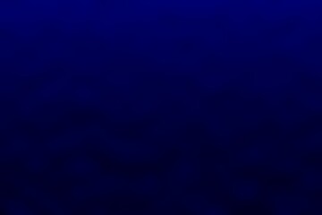 Abstract blurred background image of blue colors gradient used as an illustration. Designing posters or advertisements.