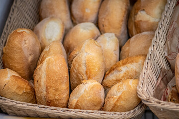 Bread for sale in a basket or shelves in a bakery in Altamura, Bari, Puglia, Italy