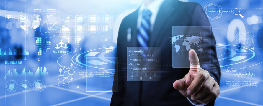Businessman touching on world map on virtual screen in digital transformation innovation technology concept to monitoring and summarize business data information