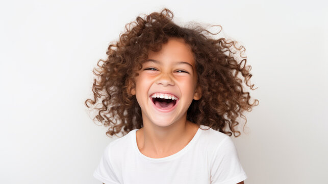 Happy african-american child girl smiling to camera over white background