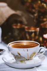 Cup of tea with lemon and honey on a wooden background. Ukrainian  or Russian style