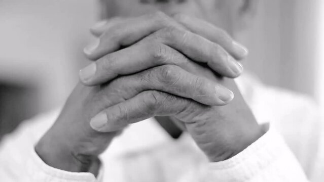 praying to god with hands together on grey background stock video stock footage