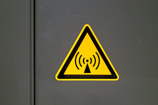 Non-ionizing radiation sign on a metal door