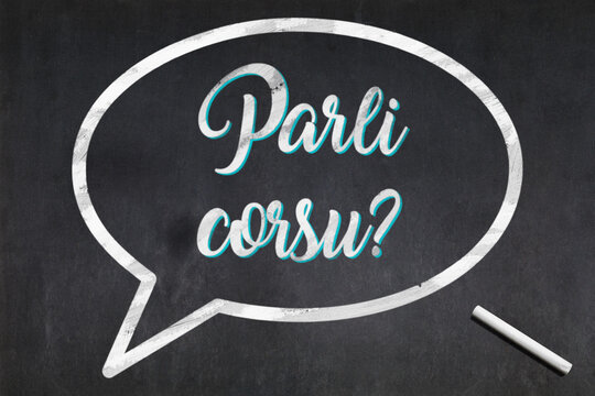 Do you speak Corsican written on a blackboard