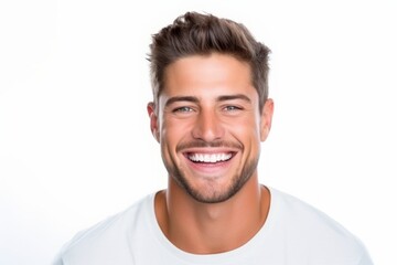 Obraz premium Studio Photo of Joyful Handsome Young Man Laughing. Photo Concept for Cosmetic or Dental Ads.