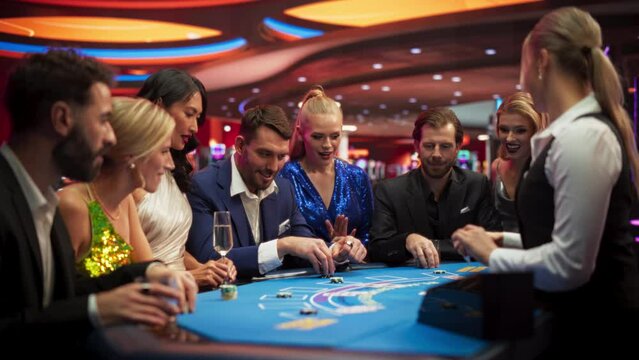 Group of Casino Goers Enjoying Time in a Modern Casino, Friends Placing Blackjack Bets, Professional Female Croupier Deals Cards. Diverse Group People Playing, Placing Bets Winning and Celebrating
