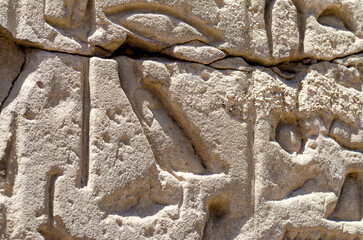ancient hieroglyphs on a stone wall in egypt