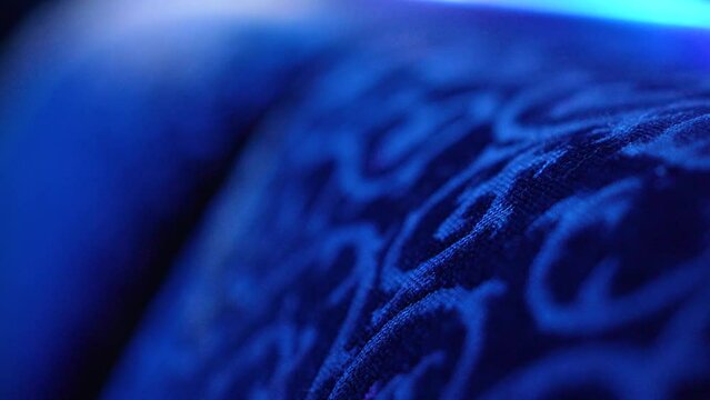 Fabric seat back in blue lighting