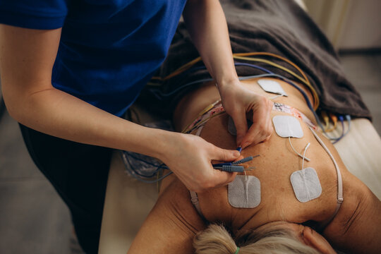 Back Pain Electrode Stimulation And Training. Electrotherapy