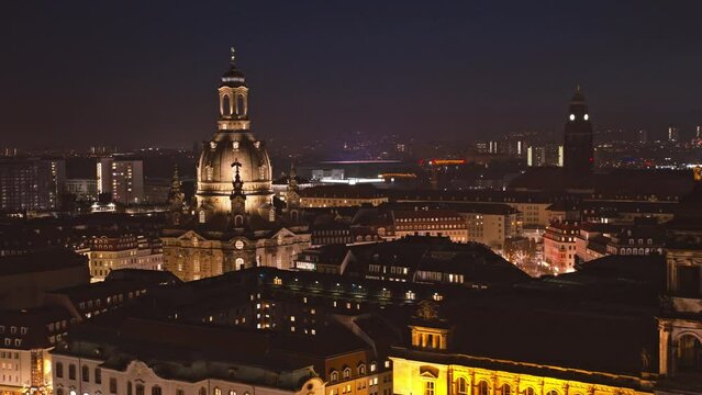 Droneshot Dresden Neumarkt from the top at night. 