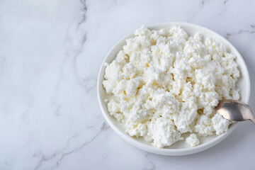 Bowl of cottage cheese from above