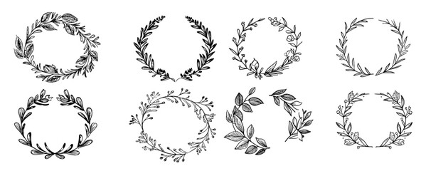 Set of 4 hand drawn spring wreaths isolated on white background, vector.