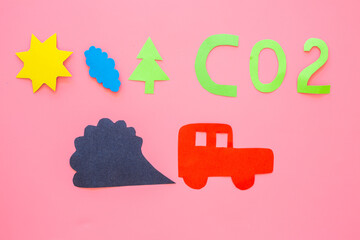 Kids paper car and traffic fumes - CO2 carbone dioxide control concept