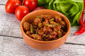 Meatball with vegetables and spices