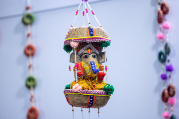 Handicraft Jute art, handmade Lord Ganesh souvenir made with jute in display at temple.